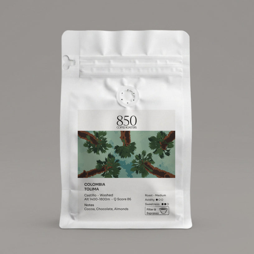 Colombia Tolima whole bean coffee in a white 850 Coffee Roasters bag