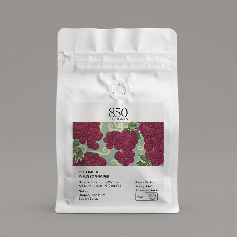 Colombia Infused Grapes whole bean coffee in a white 850 Coffee Roasters bag