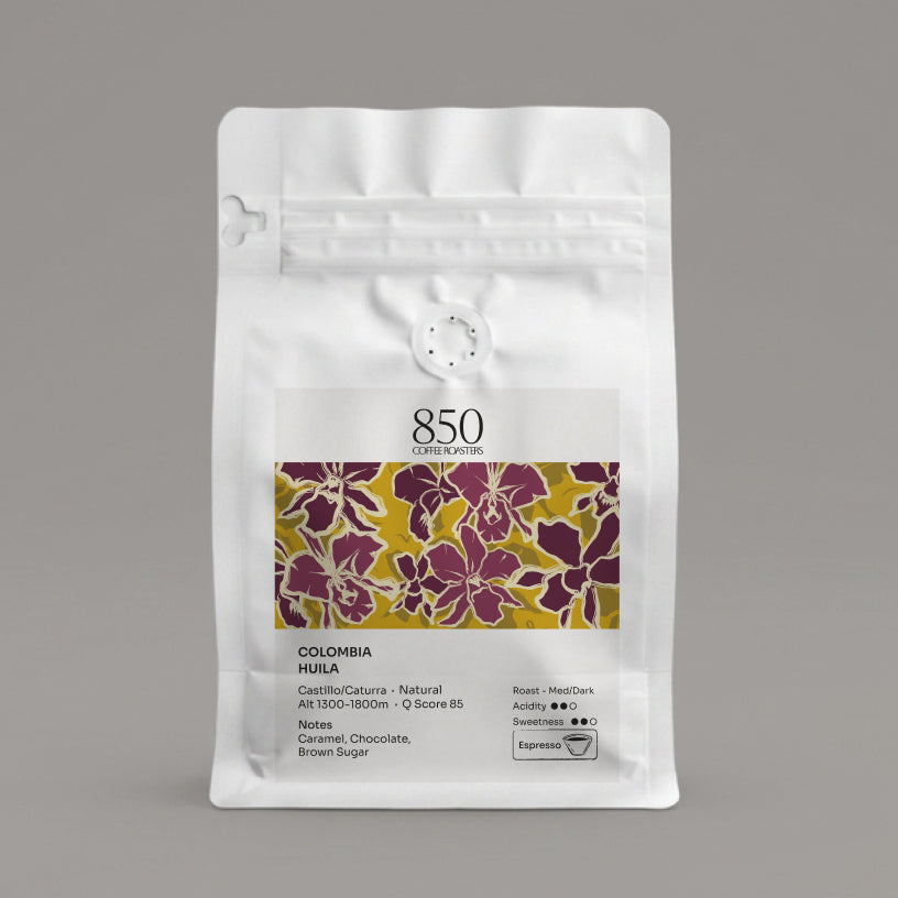 Colombia Huila whole bean coffee in a white 850 Coffee Roasters bag