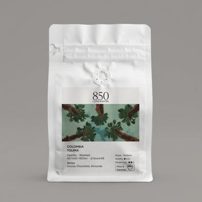 Colombia Tolima whole bean coffee in a white 850 Coffee Roasters bag