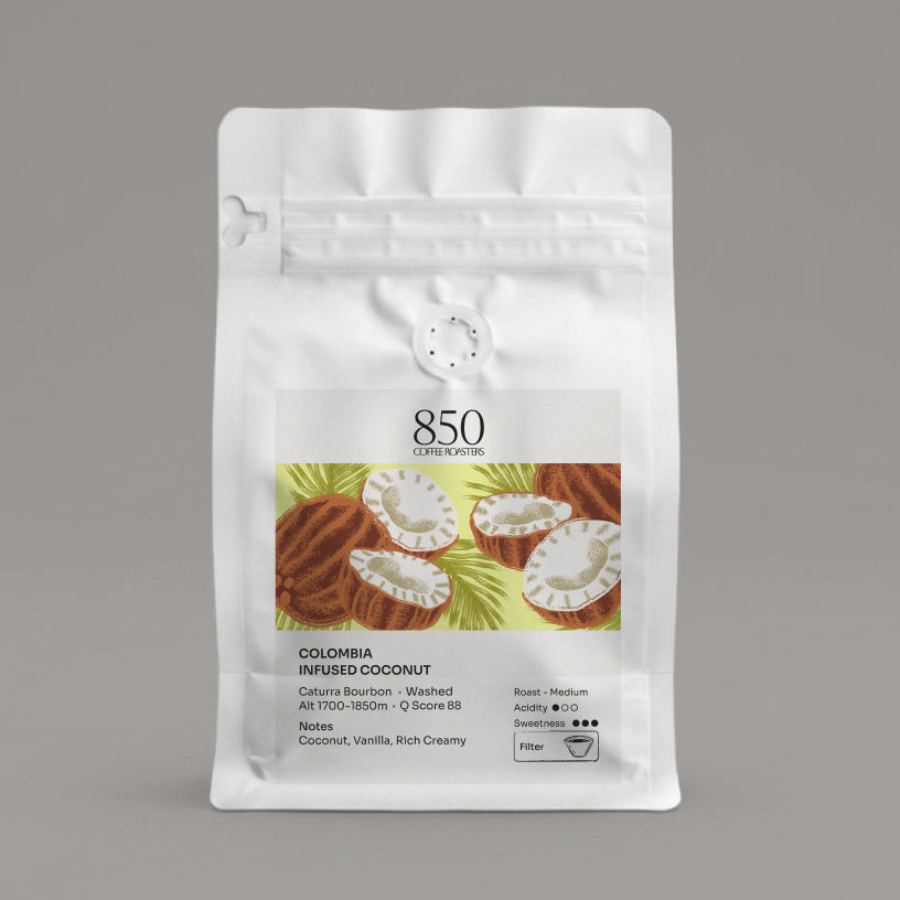 Colombia Infused Coconut whole bean coffee in a white 850 Coffee Roasters bag